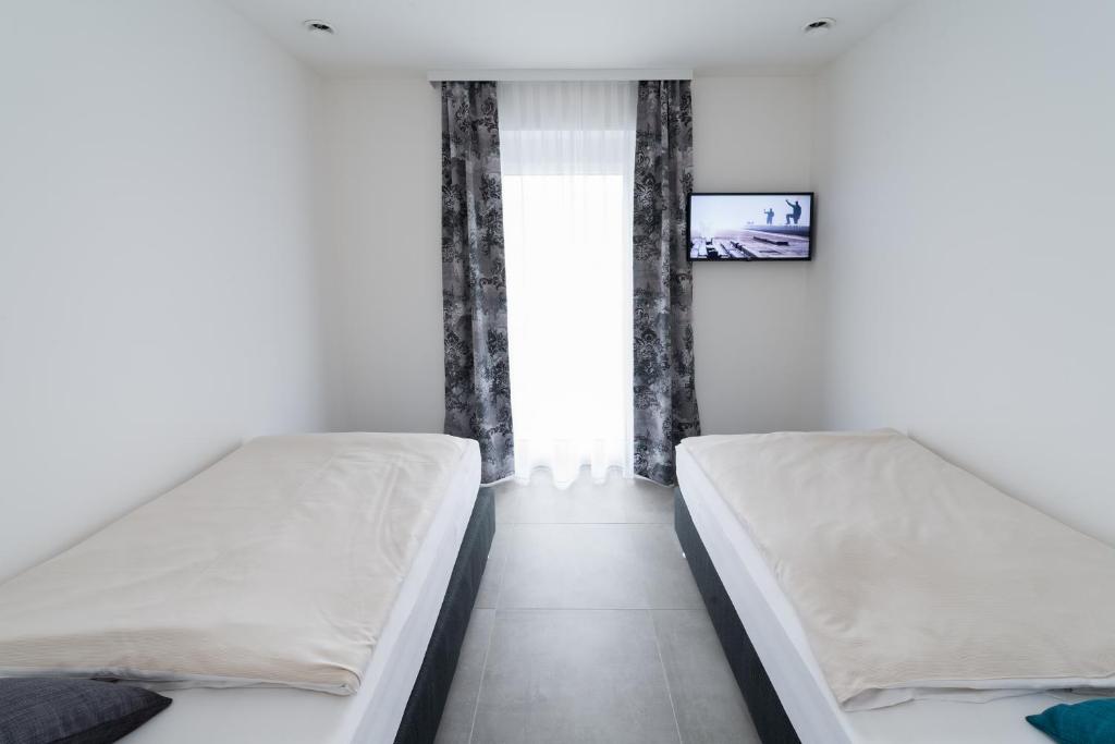 Postel nebo postele na pokoji v ubytování MOTEL24seven