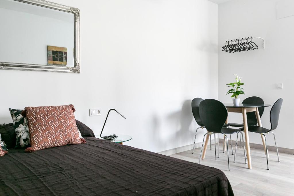 Posteľ alebo postele v izbe v ubytovaní Alameda Principal FreshApartments