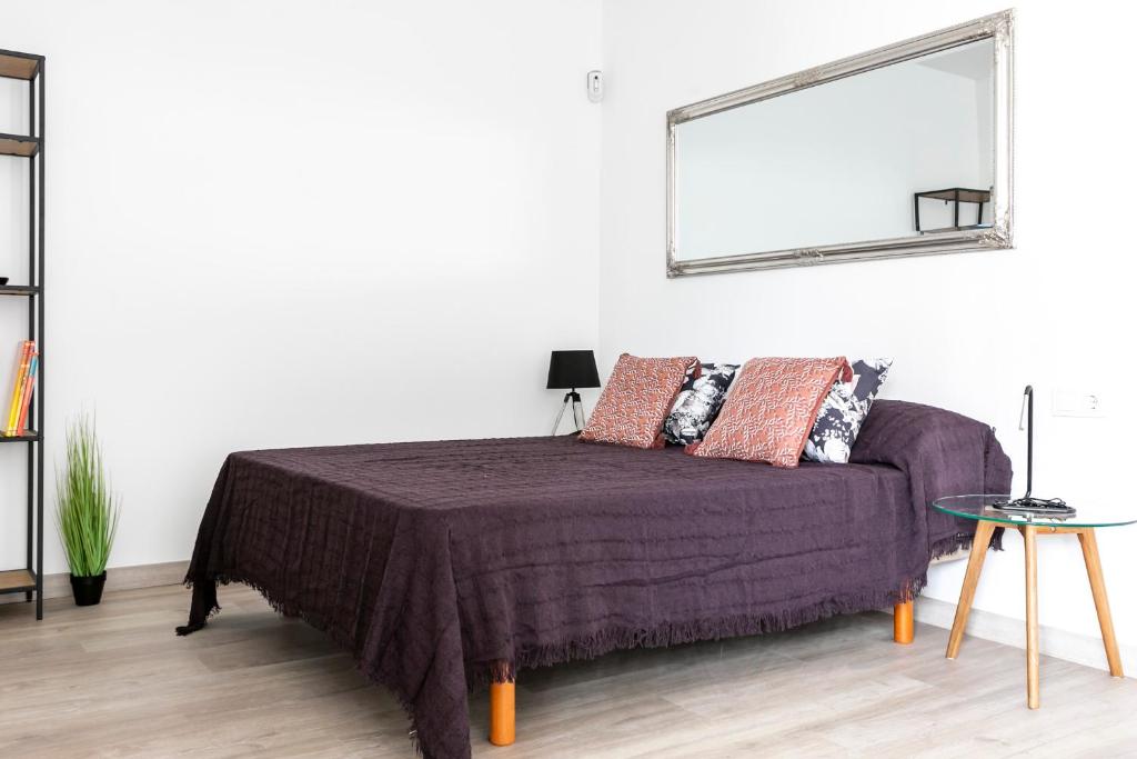 Posteľ alebo postele v izbe v ubytovaní Alameda Principal FreshApartments