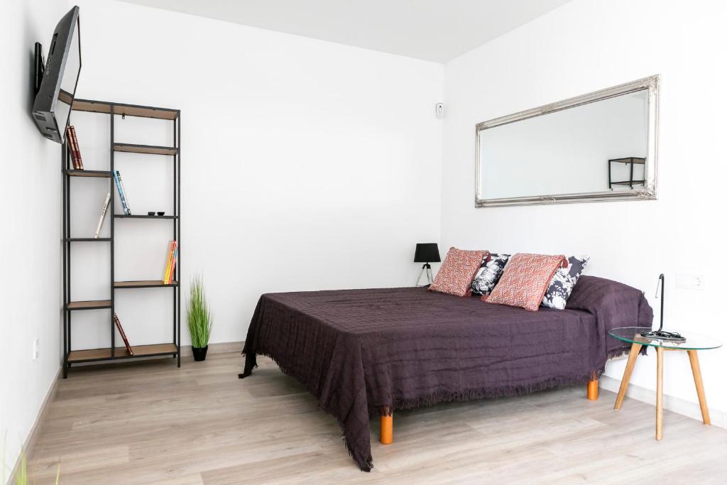 Posteľ alebo postele v izbe v ubytovaní Alameda Principal FreshApartments