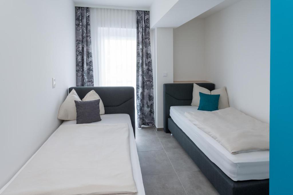 Postel nebo postele na pokoji v ubytování MOTEL24seven
