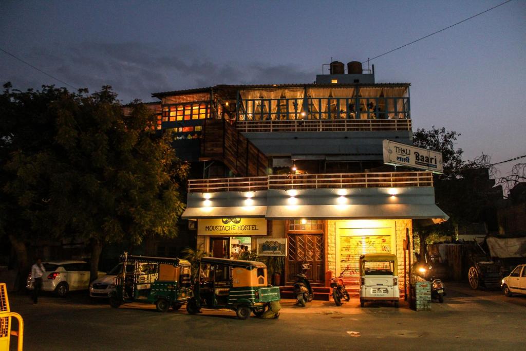 a large building with a lot of signs on it at Moustache Jodhpur in Jodhpur
