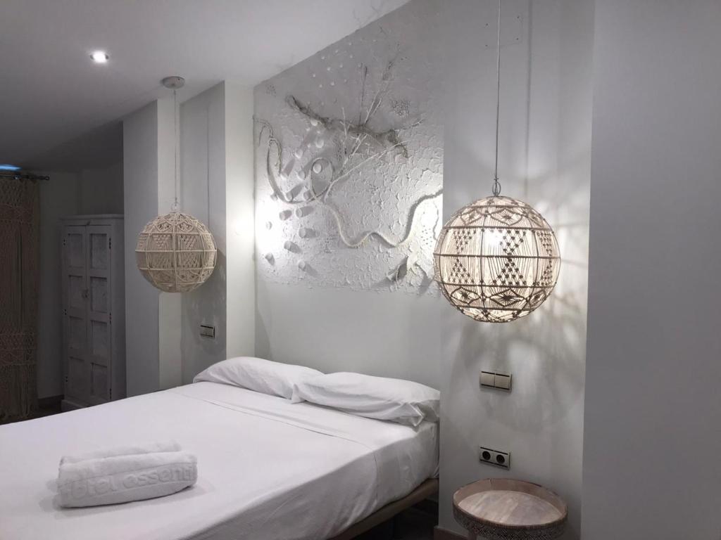 Posteľ alebo postele v izbe v ubytovaní Hotel Galería Essentia