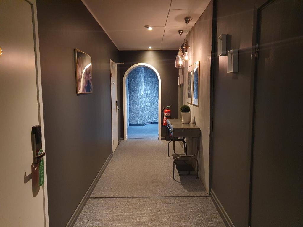 TV a/nebo společenská místnost v ubytování Unique Hotel