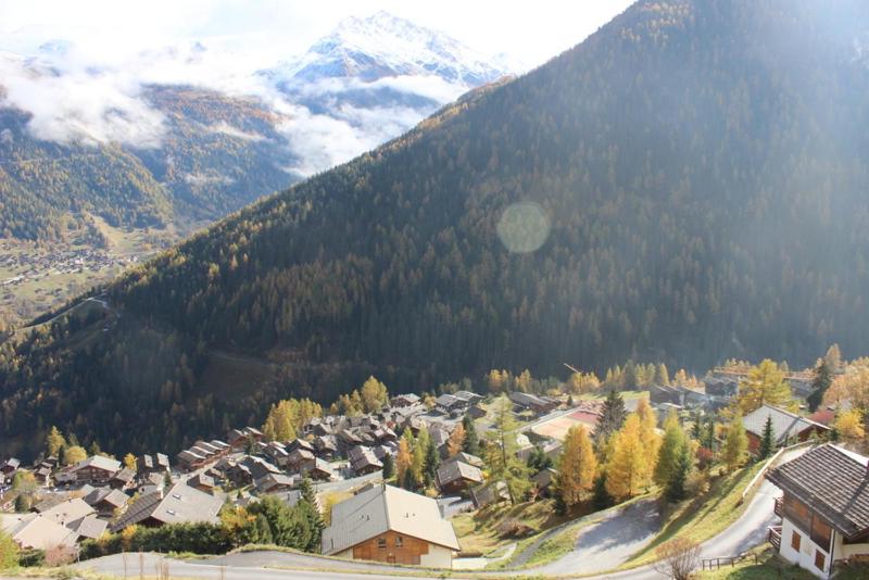 a small town in a valley with a mountain at Matti-Tinoll in Grimentz