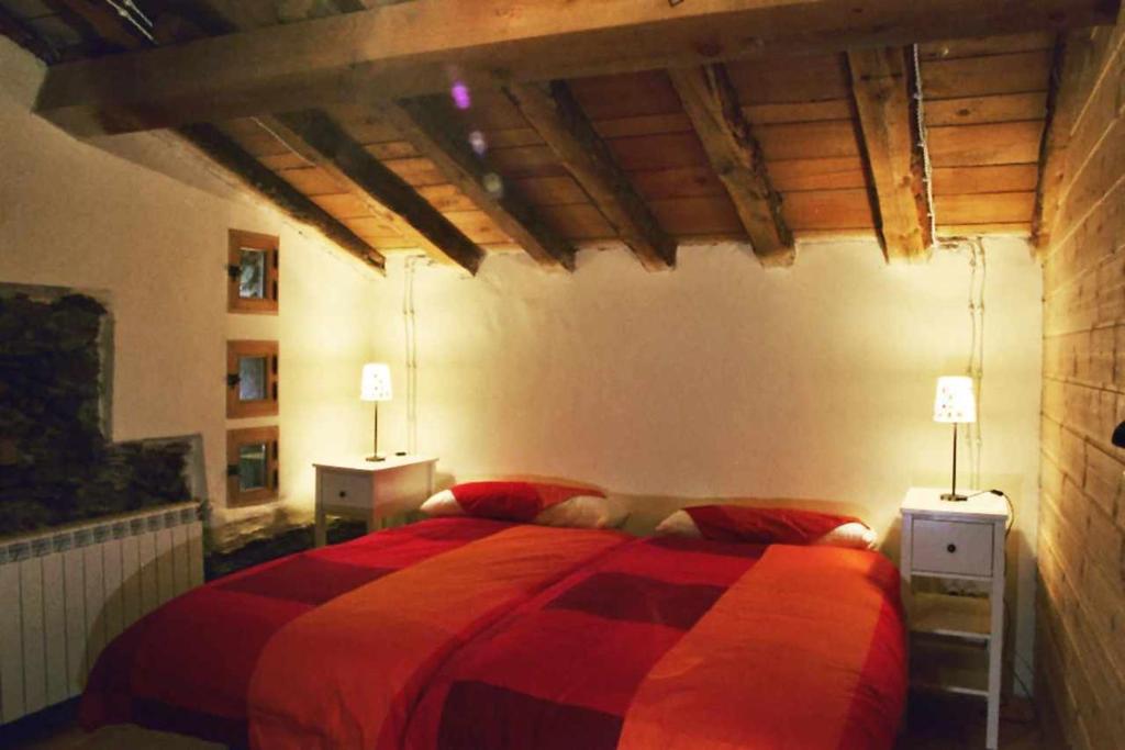 Postel nebo postele na pokoji v ubytování Casa Rural Sobre Fábulas