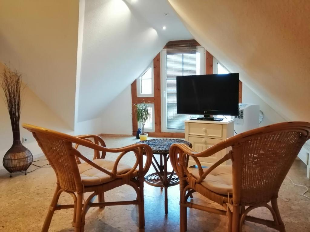 TV a/nebo společenská místnost v ubytování REGIOHOTEL Wolmirstedter Hof Wolmirstedt