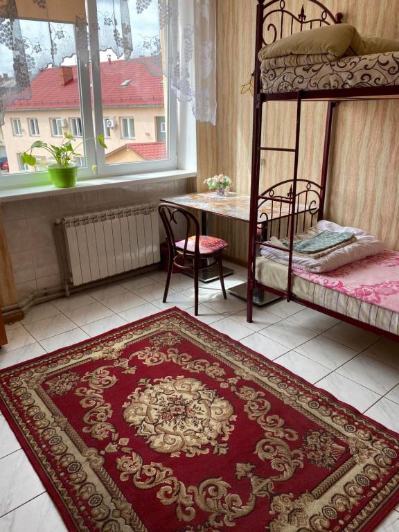 Postel nebo postele na pokoji v ubytování Centre Hostel