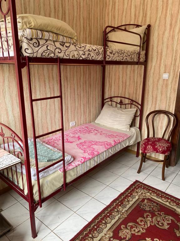 Postel nebo postele na pokoji v ubytování Centre Hostel
