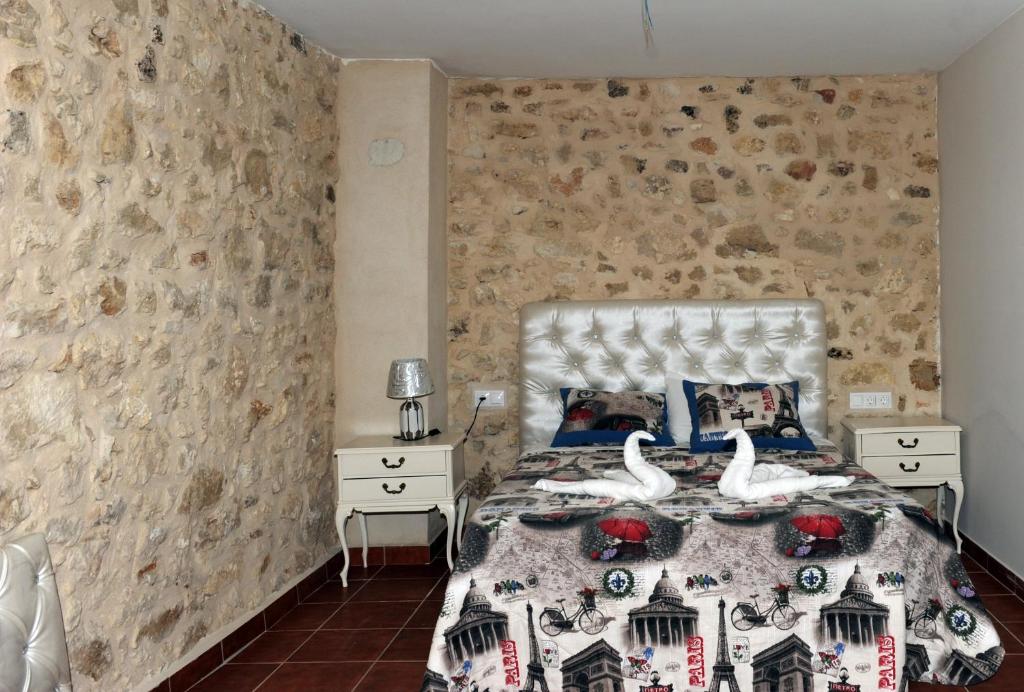 Postel nebo postele na pokoji v ubytování Hotel Rural El Labrador
