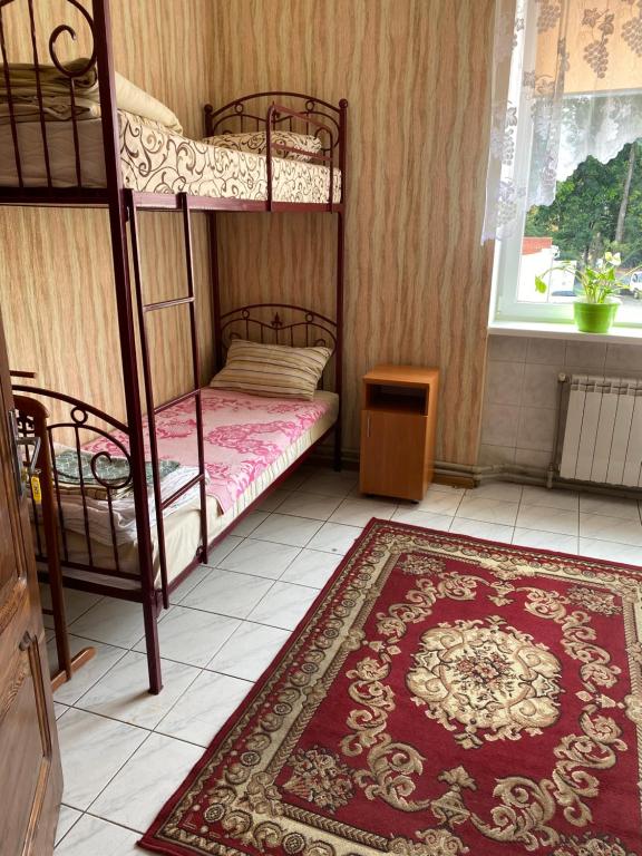 Postel nebo postele na pokoji v ubytování Centre Hostel