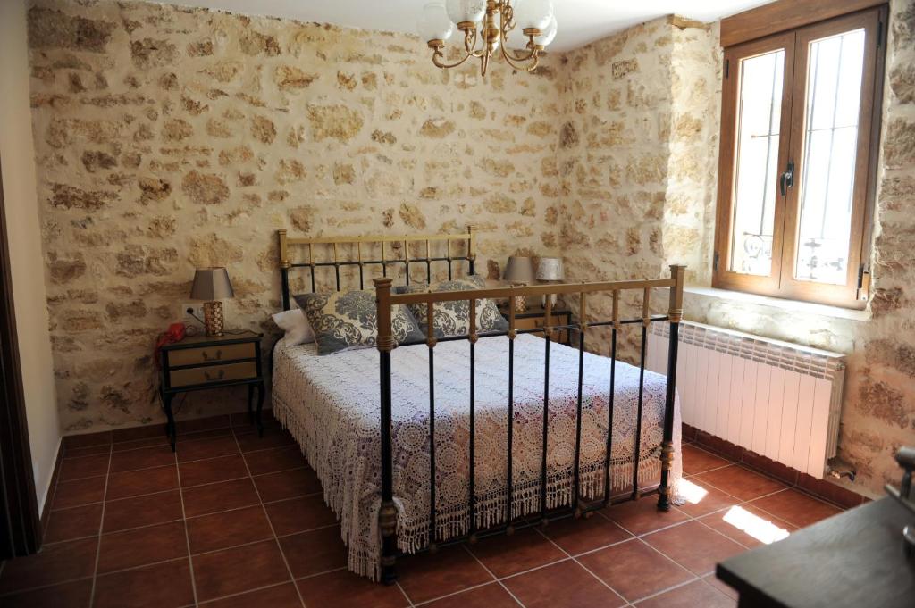 Postel nebo postele na pokoji v ubytování Hotel Rural El Labrador