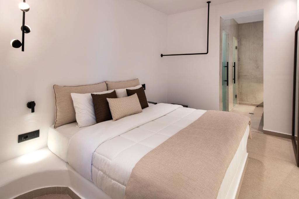 Postel nebo postele na pokoji v ubytování Gonia Residences