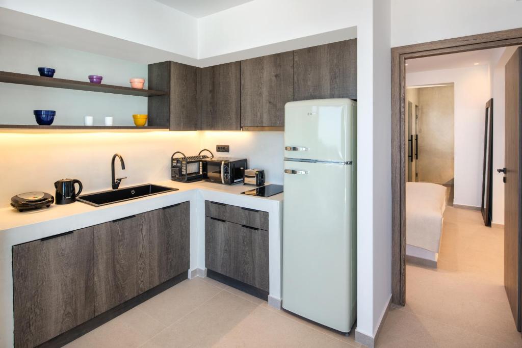 Kuchyň nebo kuchyňský kout v ubytování Gonia Residences