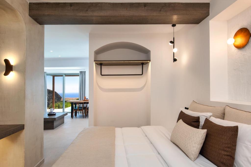 Postel nebo postele na pokoji v ubytování Gonia Residences