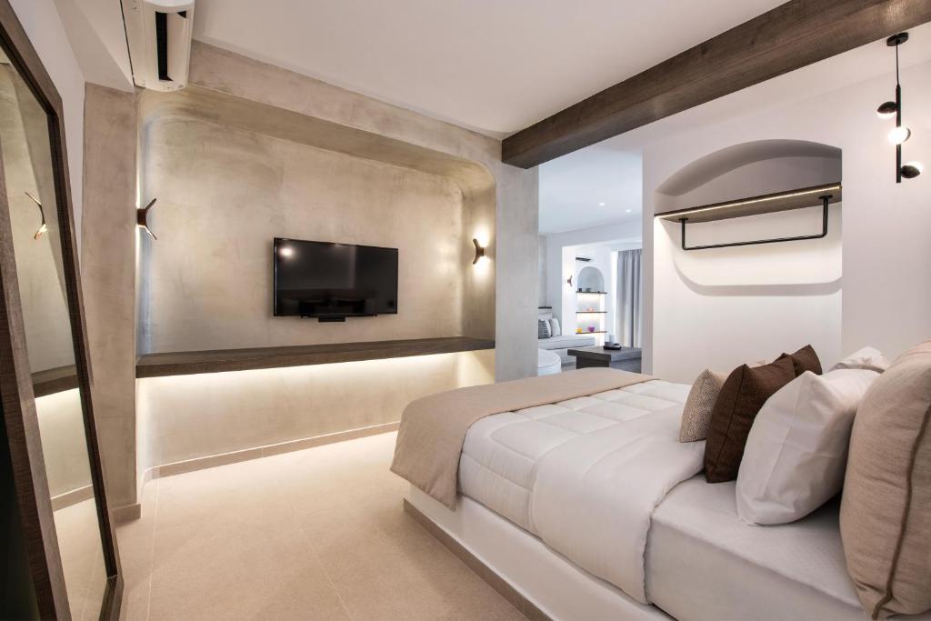 Postel nebo postele na pokoji v ubytování Gonia Residences