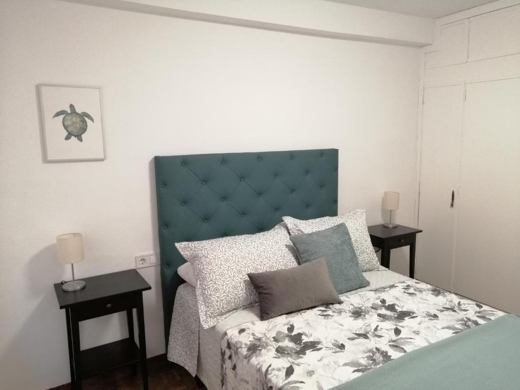 Postelja oz. postelje v sobi nastanitve Apartamento Quety Gijón