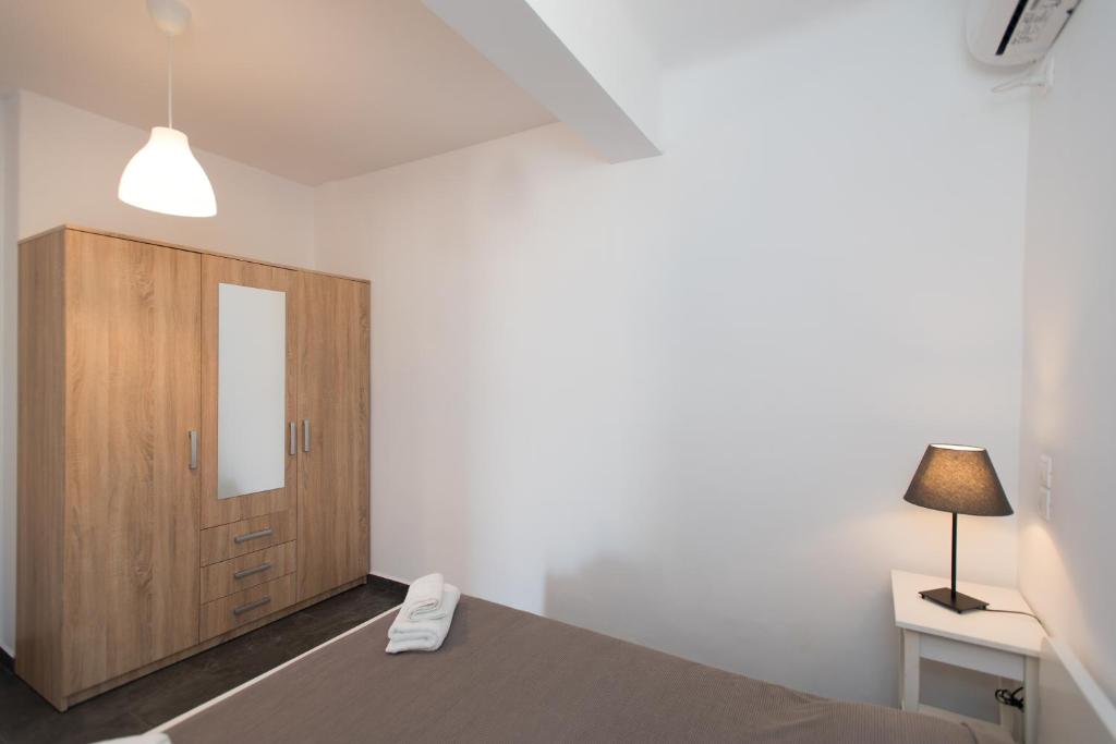 Postel nebo postele na pokoji v ubytování A&A House Mykonos B