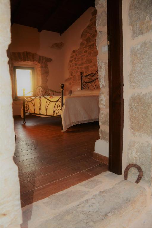 Letto o letti in una camera di B&B Le Fate