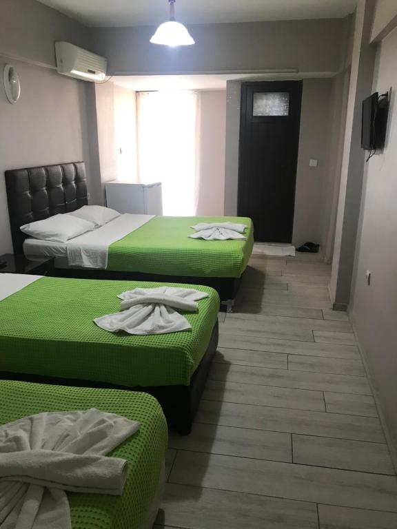 Postel nebo postele na pokoji v ubytování Anatolia Hotel