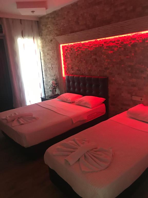 Postel nebo postele na pokoji v ubytování Anatolia Hotel