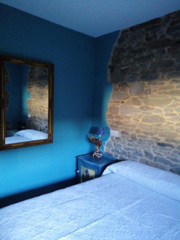 Postel nebo postele na pokoji v ubytování Casa Rural Calecha