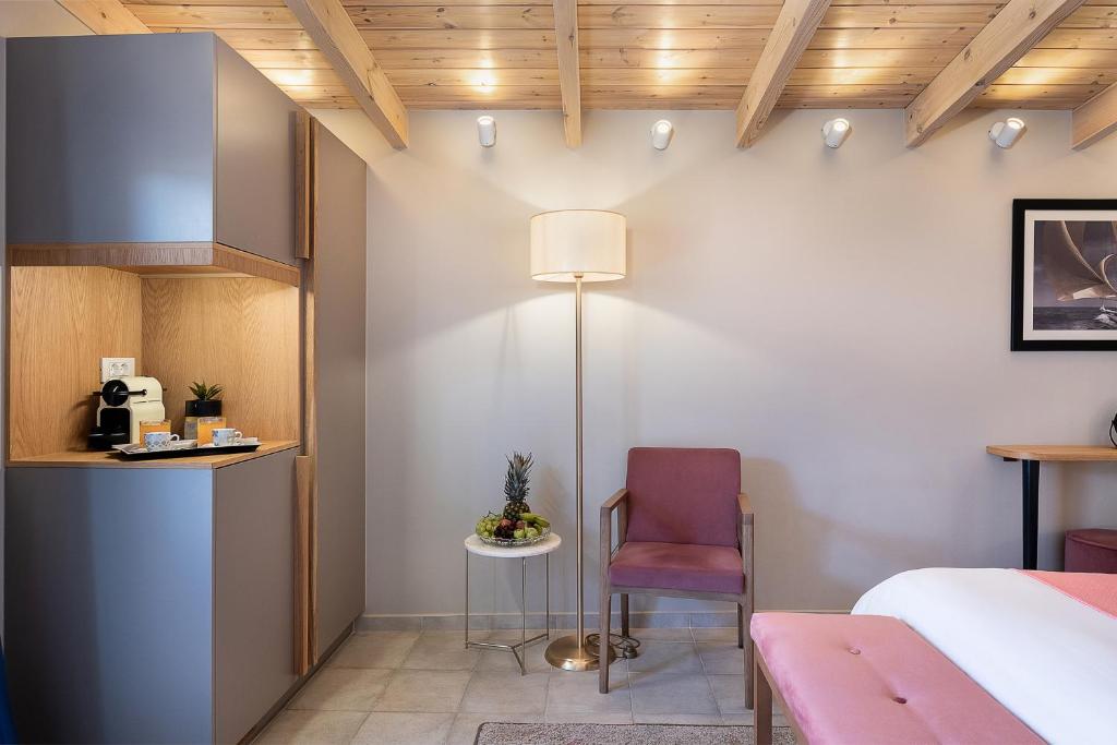 Voodi või voodid majutusasutuse Viaggio Elegant Rooms toas