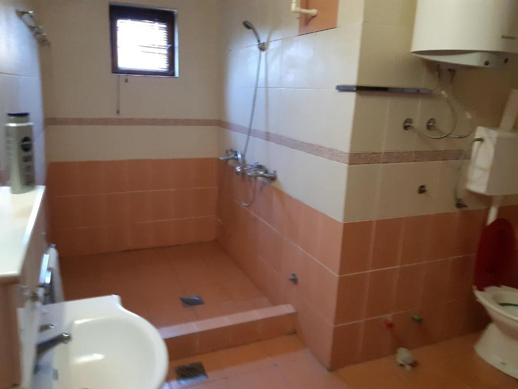 Koupelna v ubytování Prenociste Pecinci Biker Friendly