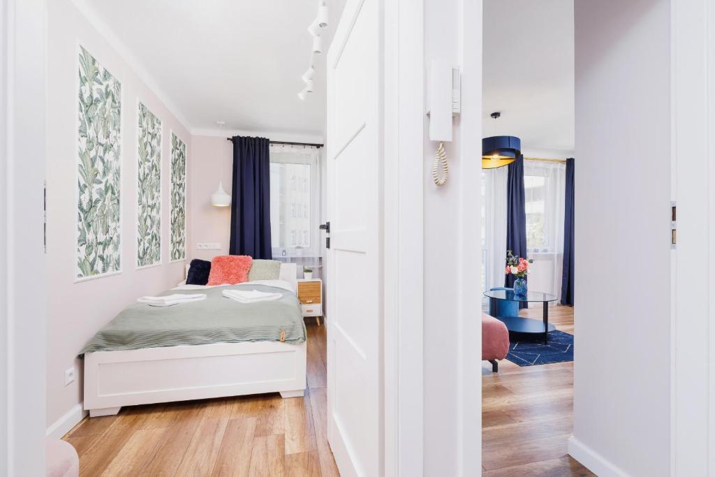 Posteľ alebo postele v izbe v ubytovaní Apartament przy Bulwarach Wiślanych Kościuszki by Noclegi Renters