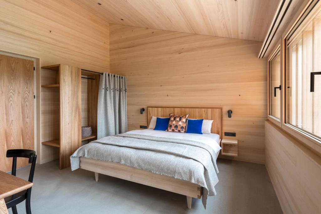 Postel nebo postele na pokoji v ubytování Fuchsegg Eco Lodge