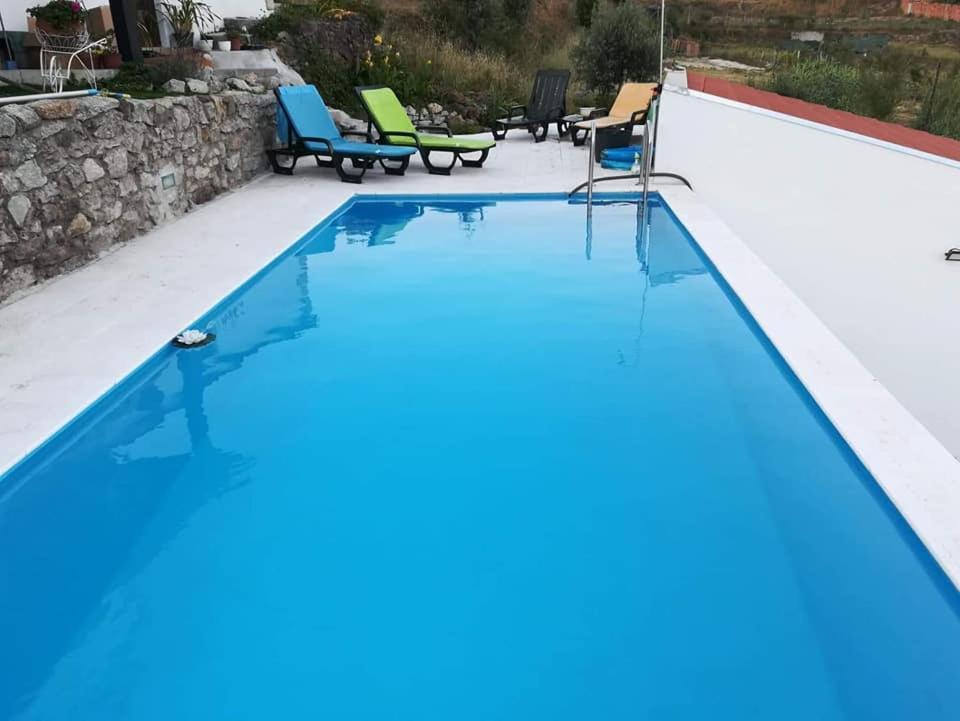 Swimmingpoolen hos eller tæt på Quinta do Cavaleiro ao Sol - um lugar ao sol