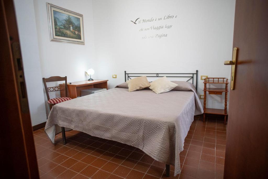 Postel nebo postele na pokoji v ubytování Poesia del Mare B&B