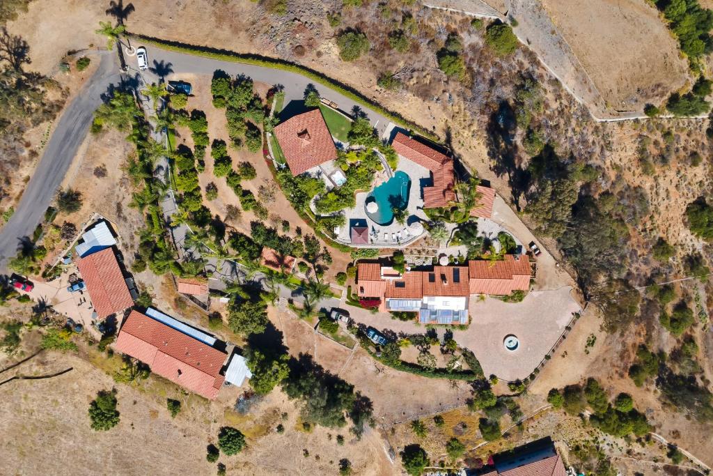 an overhead view of a house with a yard at Vista Retreat in Vista