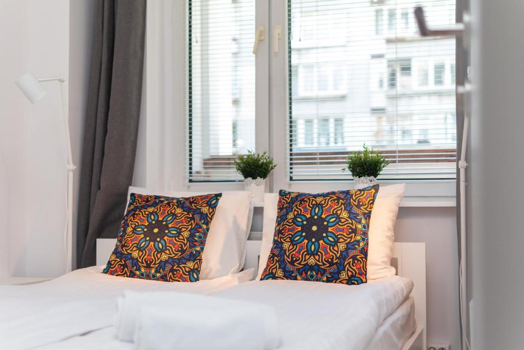 Posteľ alebo postele v izbe v ubytovaní Królewska 43 by Homeprime