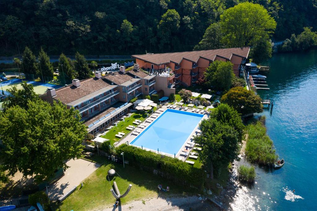 an aerial view of a resort with a swimming pool at Hotel L'Approdo in Pettenasco