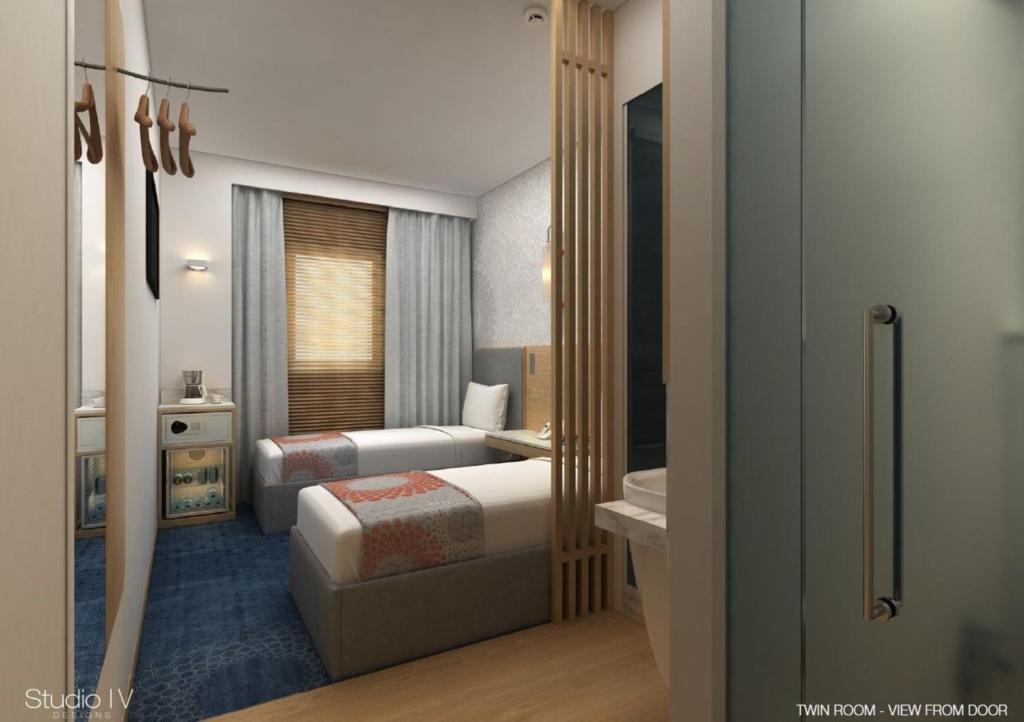 Postel nebo postele na pokoji v ubytování Holiday Inn Express Chennai OMR Thoraipakkam by IHG