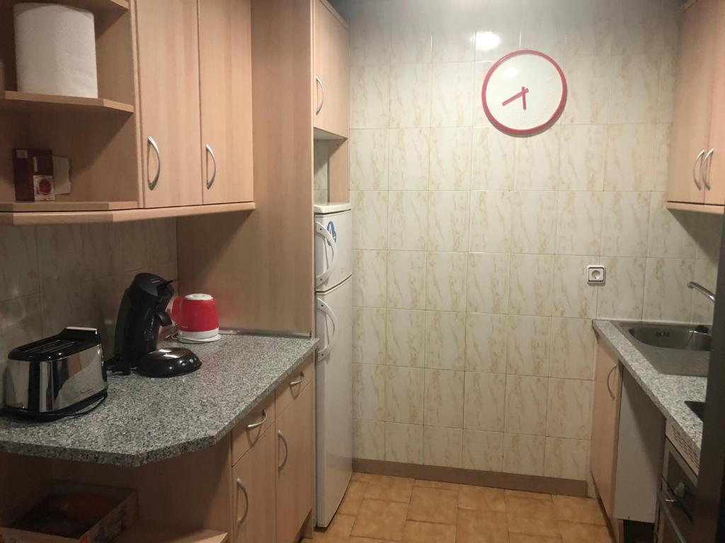 A kitchen or kitchenette at Aparment Puerta de sol