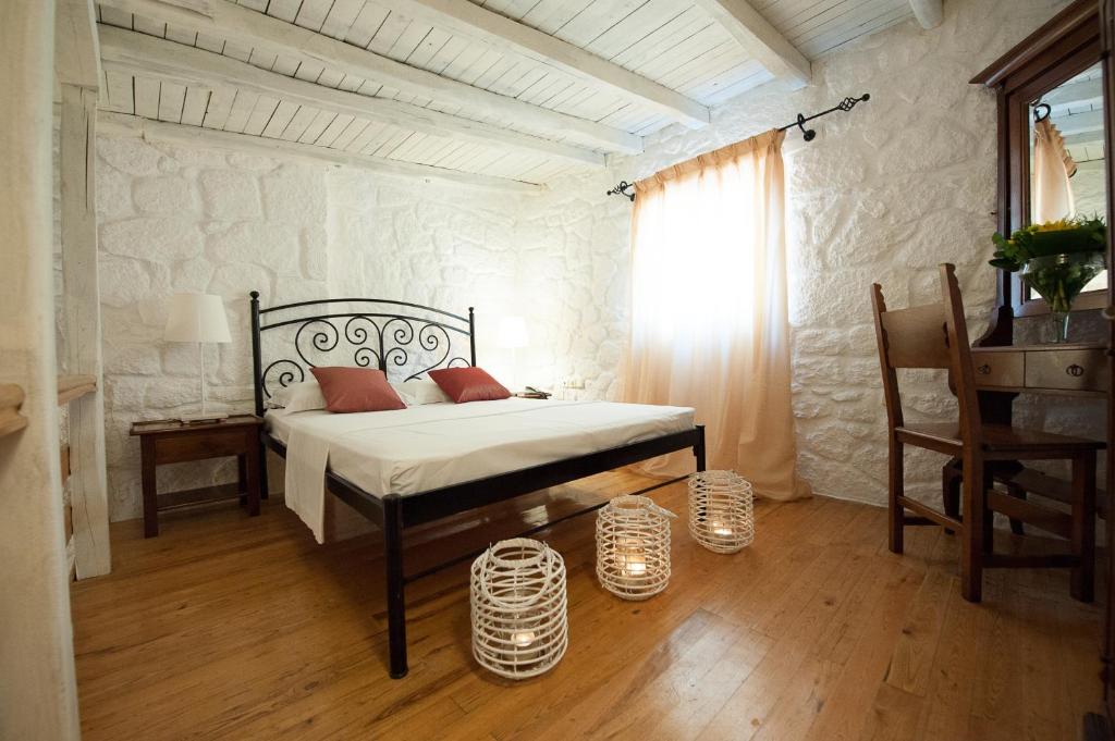 Voodi või voodid majutusasutuse Petrino Eco Village toas