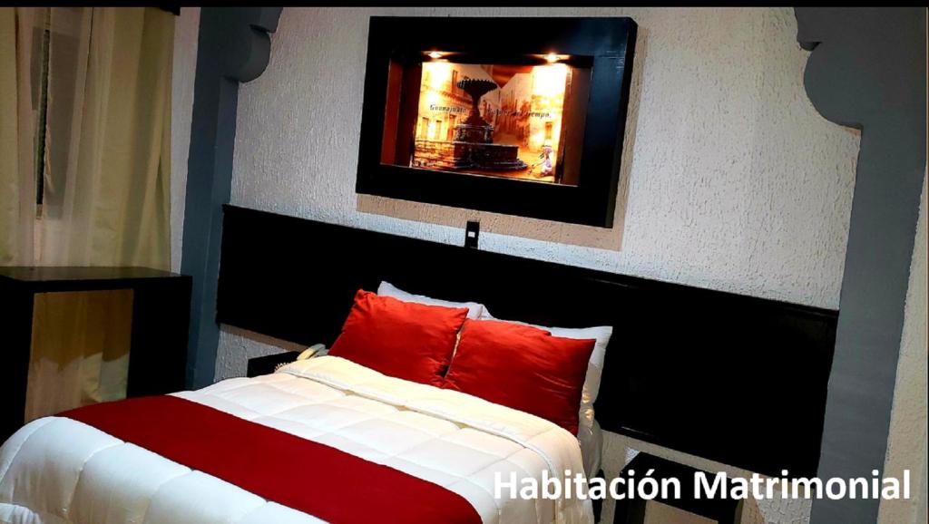 Postel nebo postele na pokoji v ubytování Hotel Murillo Plaza