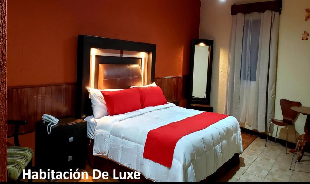 Postel nebo postele na pokoji v ubytování Hotel Murillo Plaza