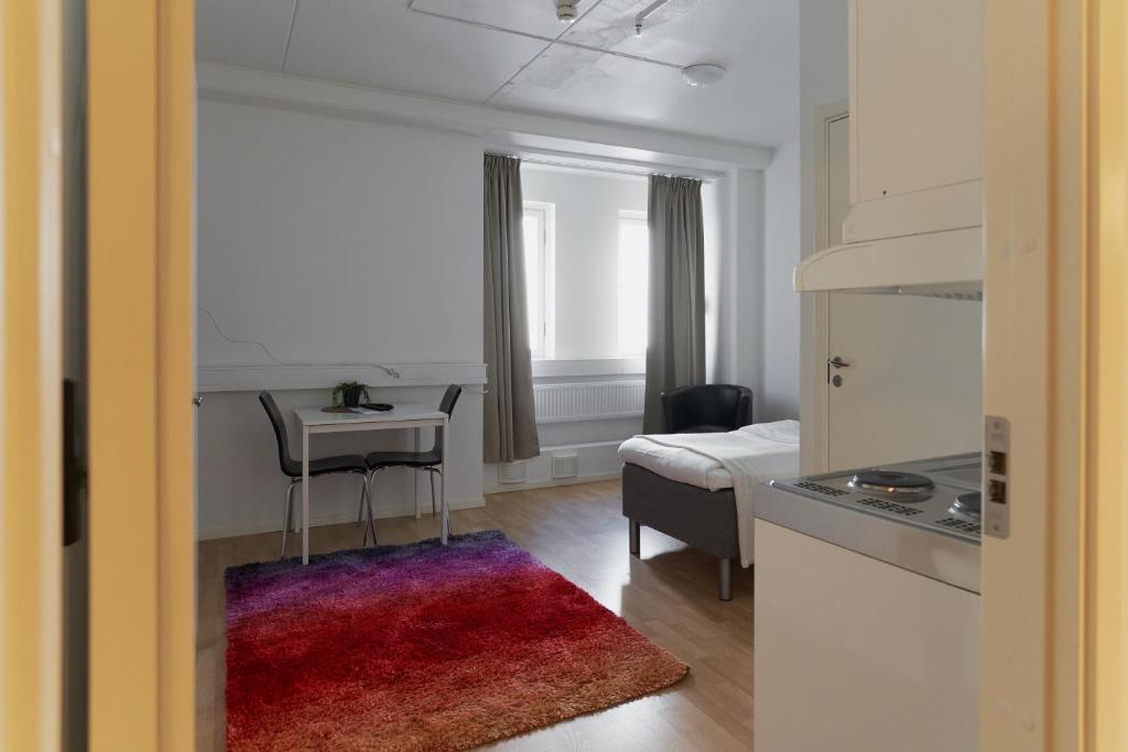 Kuchyň nebo kuchyňský kout v ubytování Slagsta Gate Hotell