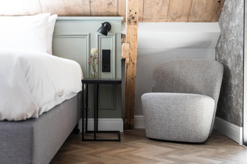 Postel nebo postele na pokoji v ubytování Ysbrantsz Boutique Hotel