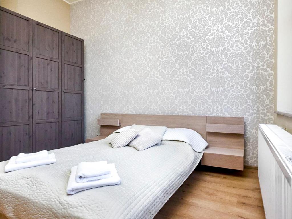 Postel nebo postele na pokoji v ubytování Willa Józefina - Mini Spa & Family Fun