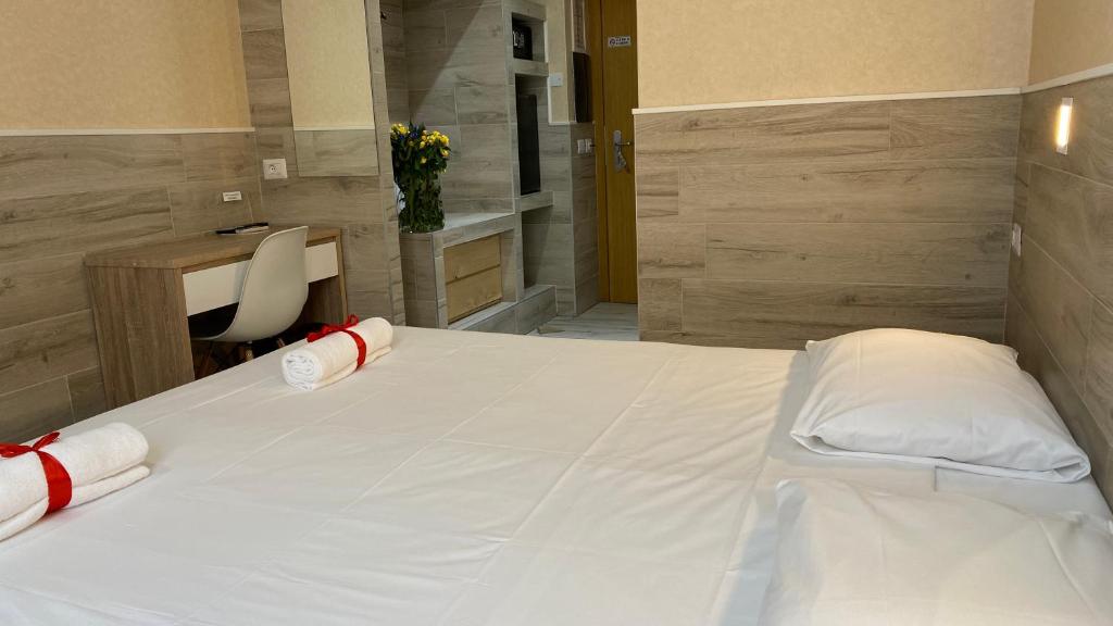 Łóżko lub łóżka w pokoju w obiekcie Eurohotel