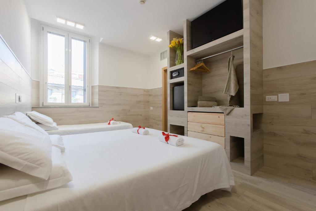 Łóżko lub łóżka w pokoju w obiekcie Eurohotel