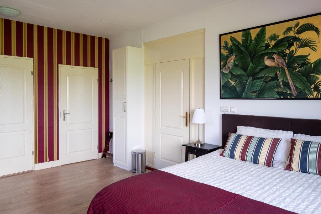 Postel nebo postele na pokoji v ubytování B&B Landleven