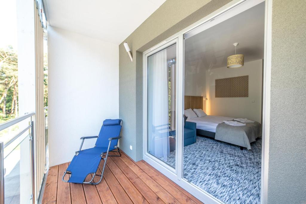 Postel nebo postele na pokoji v ubytování WYDMA Resort Medi & SPA - Normobaria