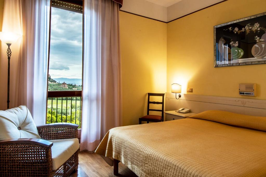 Postel nebo postele na pokoji v ubytování Fortuna Resort