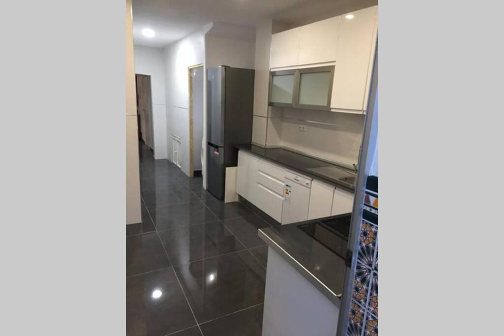 Posteľ alebo postele v izbe v ubytovaní CASA REFORMADA CON TERRAZA/WIFI/AIRE ACONDICIONADO