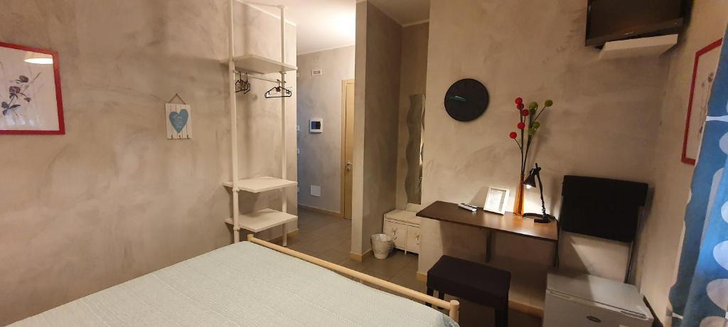 Postel nebo postele na pokoji v ubytování Affittacamere Borgo Sabbionara